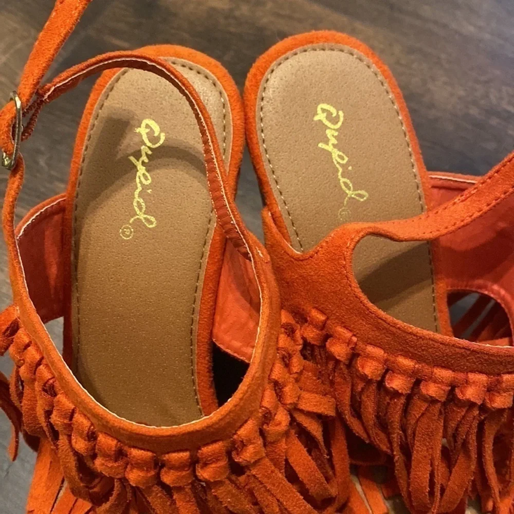 QUPID burnt orange suede fringe wedges.
